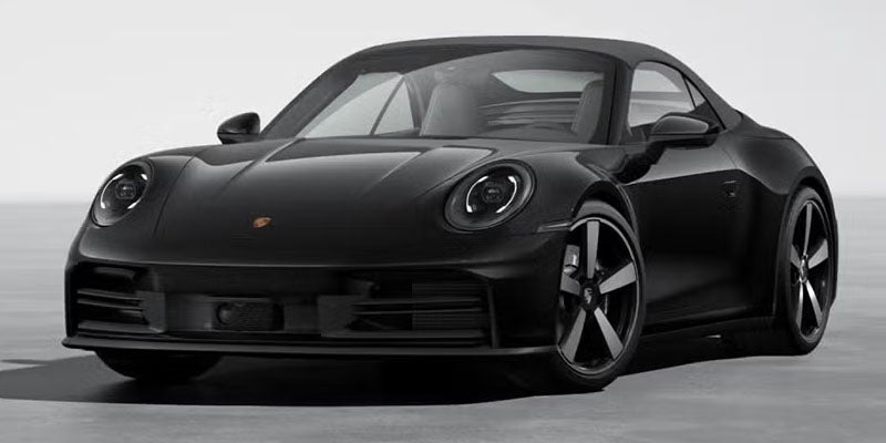 A sleek, black Porsche 911 Targa 4S heritage edition, angled from the front-left, roof removed.