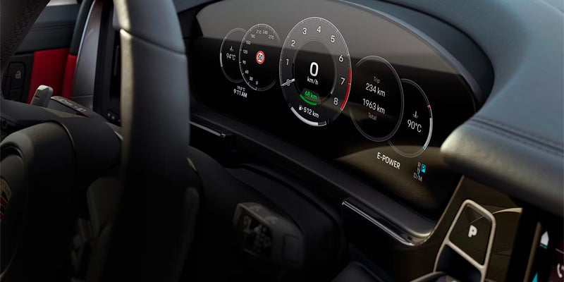 A modern car's digital dashboard displaying speed, mileage, temperature, and "E-POWER."